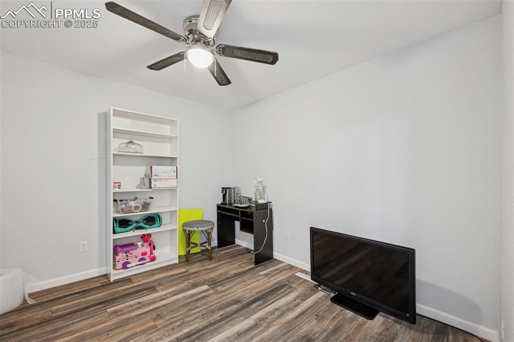 Image 14 of 31: Bedroom #1, featuring a ceiling fan with light, laminate flooring, and clos