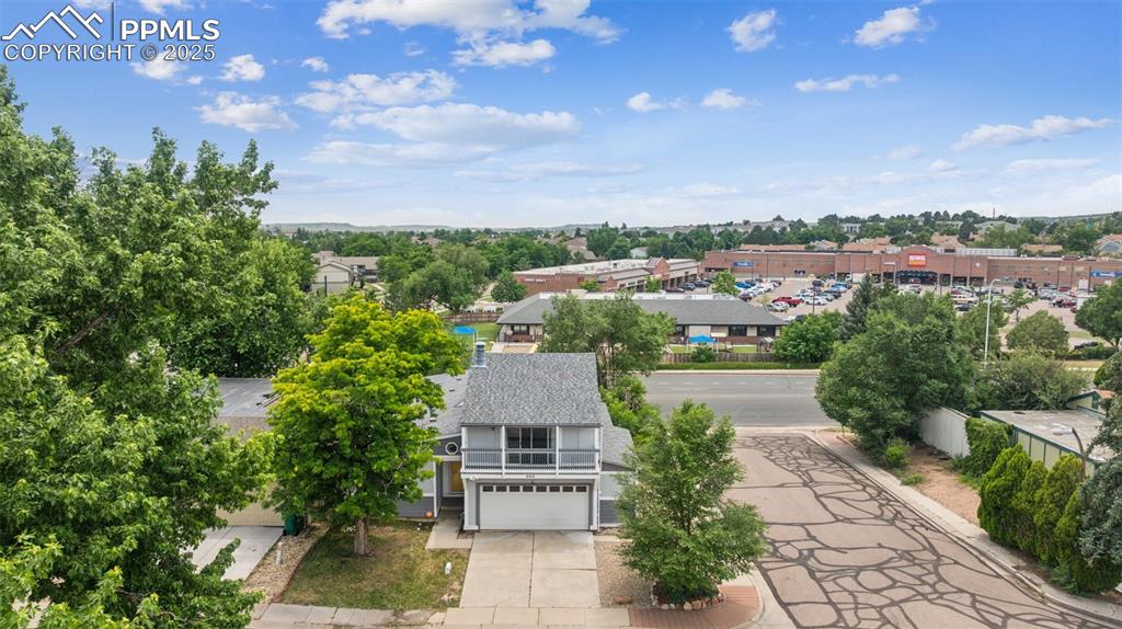 Image 22 of 31: Aerial view with nearby shopping area