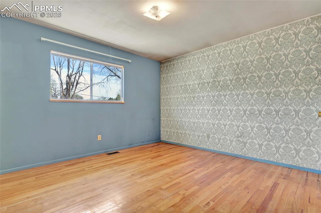 Image 15 of 36: Hardwood flooring throughout