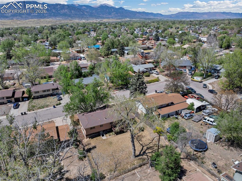Image 36 of 36: Aerial perspective showcasing a residential neighborhood with distant mount