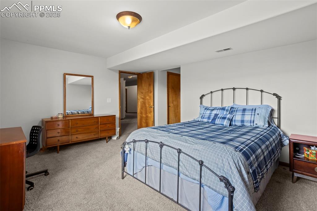 Image 23 of 36: Basement bedroom 1