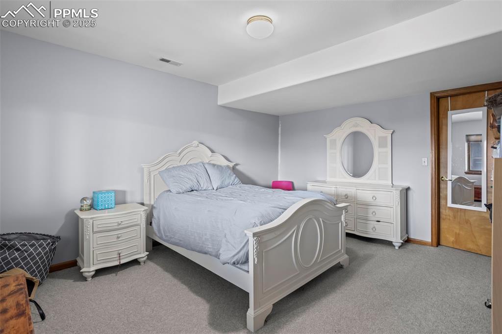 Image 25 of 36: Basement bedroom 2