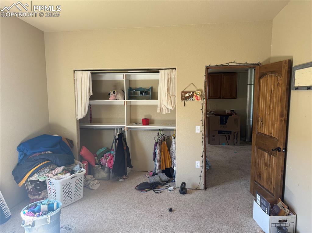 Image 11 of 14: Bedroom