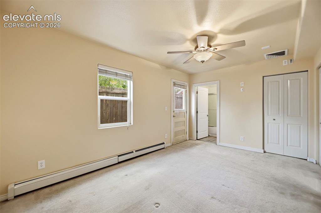 Image 11 of 45: Main-level Primary Bedroom