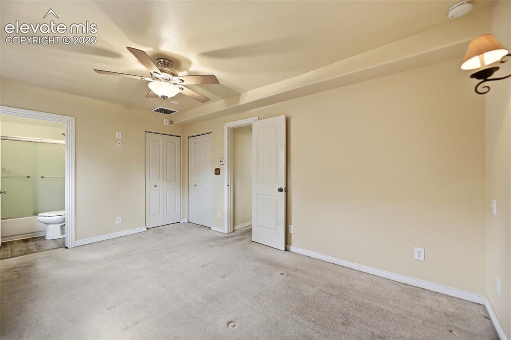 Image 12 of 45: Main-level Primary Bedroom