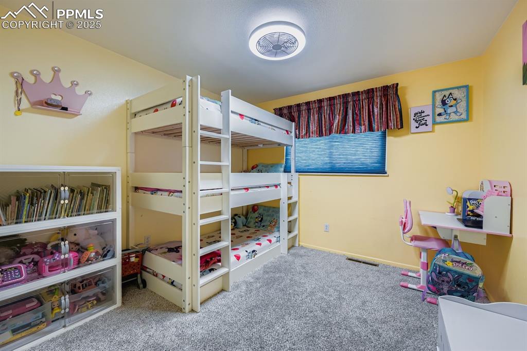 Image 21 of 28: Bedroom