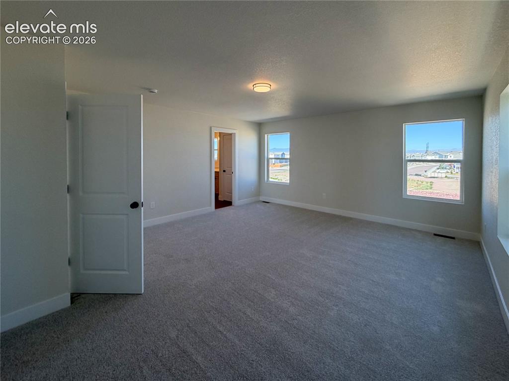 Image 16 of 33: Master Bedroom