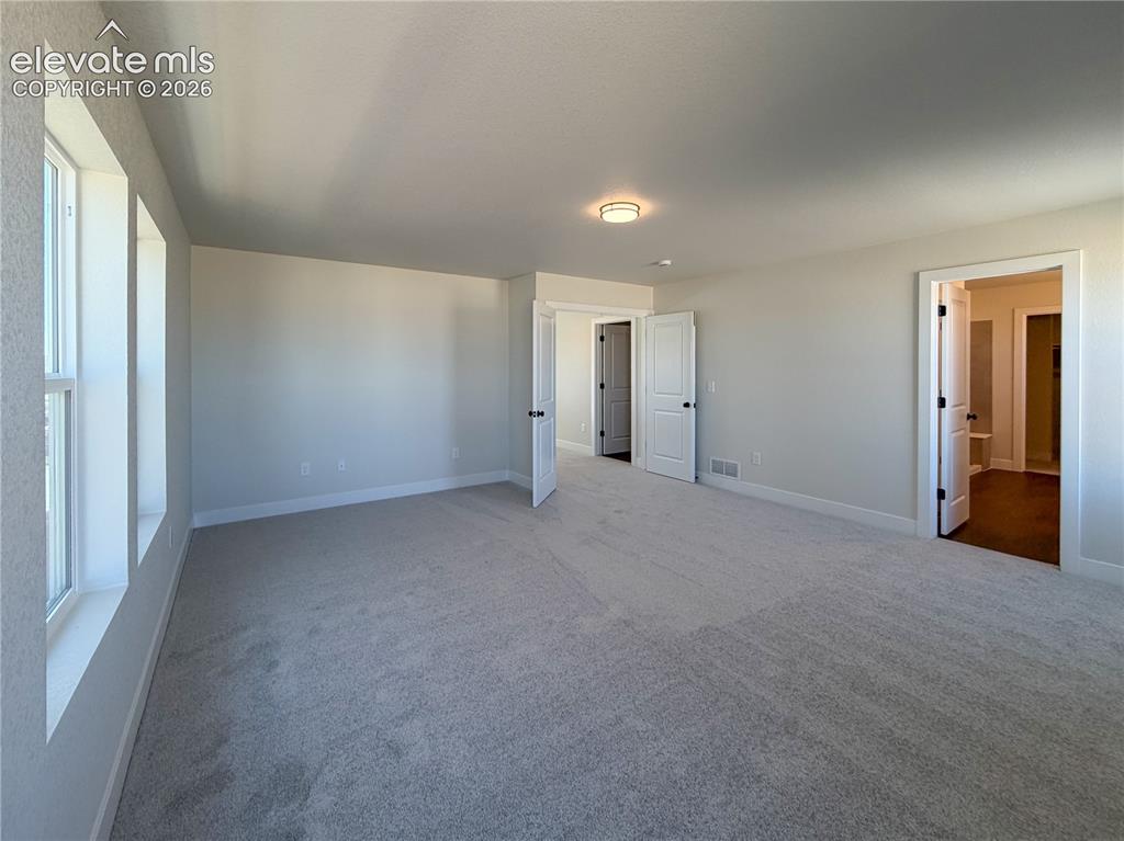 Image 18 of 33: Master Bedroom