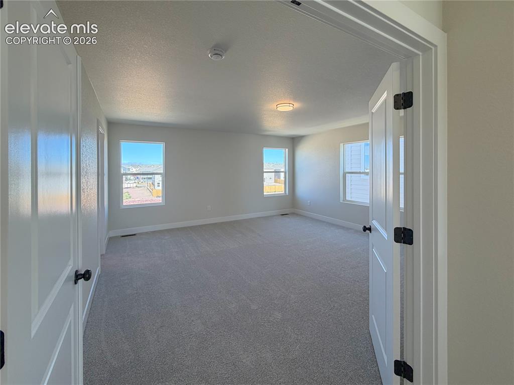 Image 19 of 33: Master Bedroom