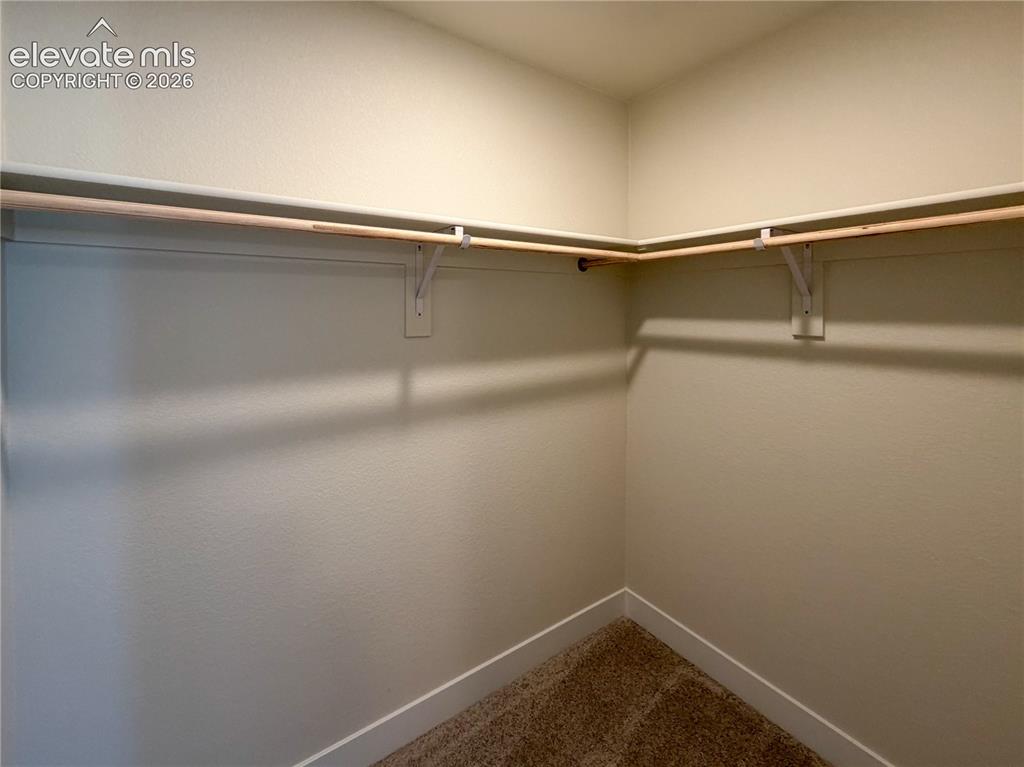 Image 29 of 33: Walk-In Closets
