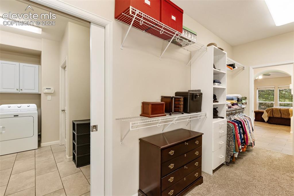 Image 24 of 50: Master bedroom enormous walk-in closet