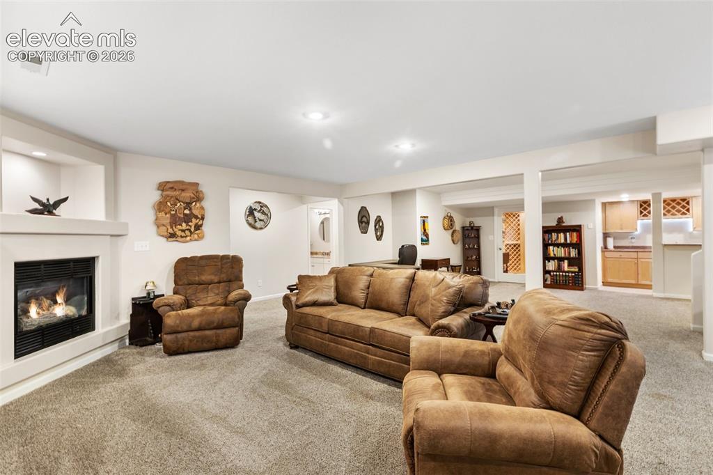 Image 29 of 50: Lower level family room