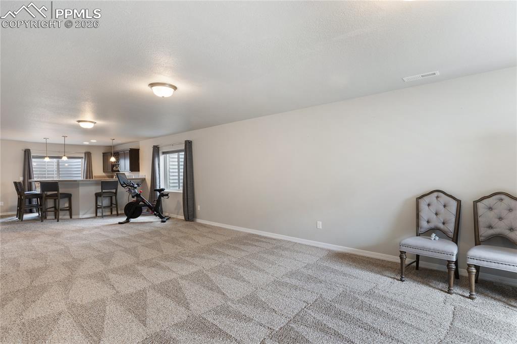 Image 28 of 41: Open basement layout with abundant room for entertaining or recreation