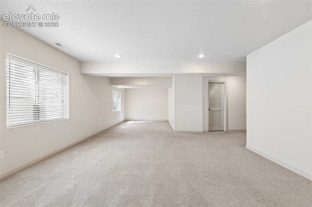 Image 24 of 34: Relax or entertain in the massive family room