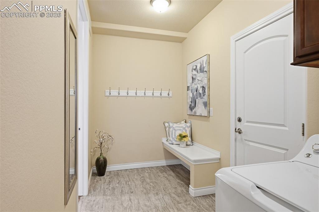 Image 27 of 45: Laundry Room, With Mudroom Area Attached, Coming In From The Garage.