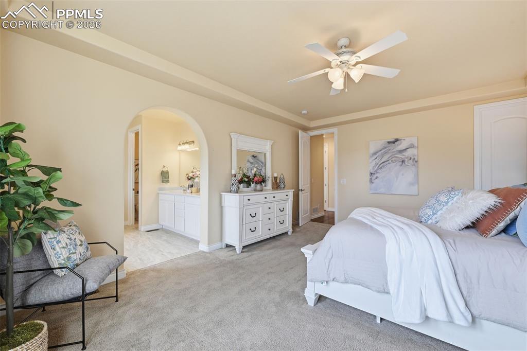 Image 29 of 45: Main Floor Primary Bedroom View Towards Hallway And Primary Bathroom Attach