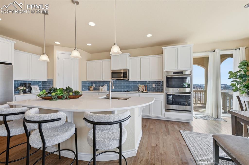 Image 3 of 45: Gourmet Kitchen, Huge Island, Double Ovens, Walk In Pantry, Flowing Into Di