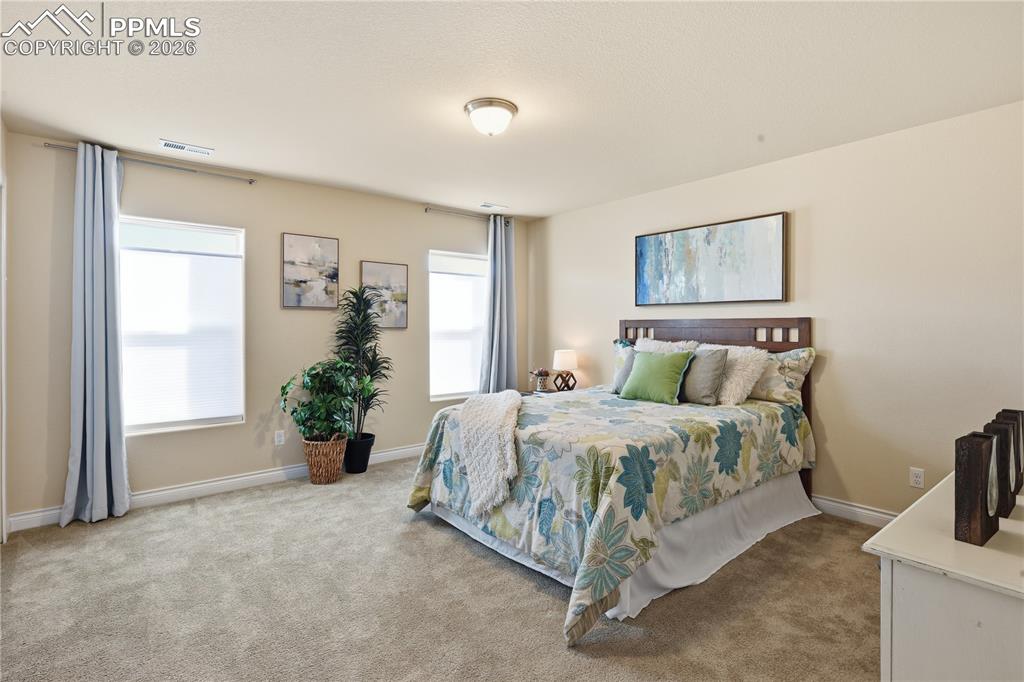 Image 34 of 45: Larger Second Bedroom