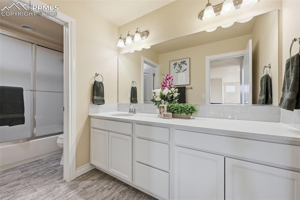 Image 39 of 45: Second floor full bathroom, great counter space!