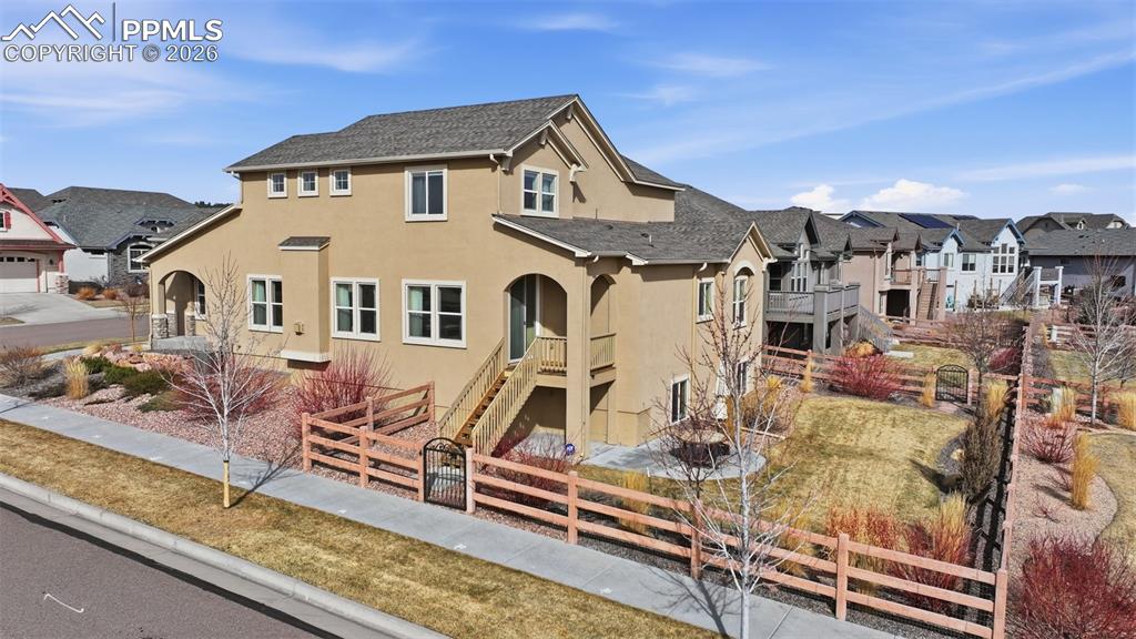 Image 41 of 45: Side view of corner lot and back yard.