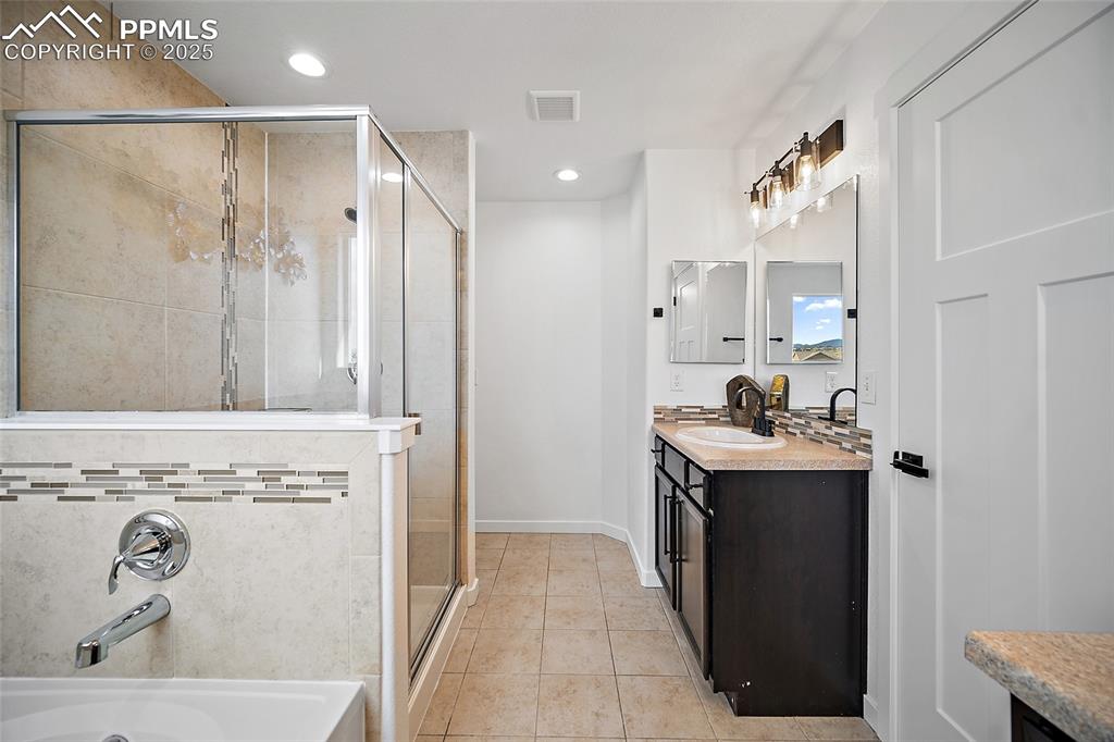 Image 30 of 50: Master Bathroom