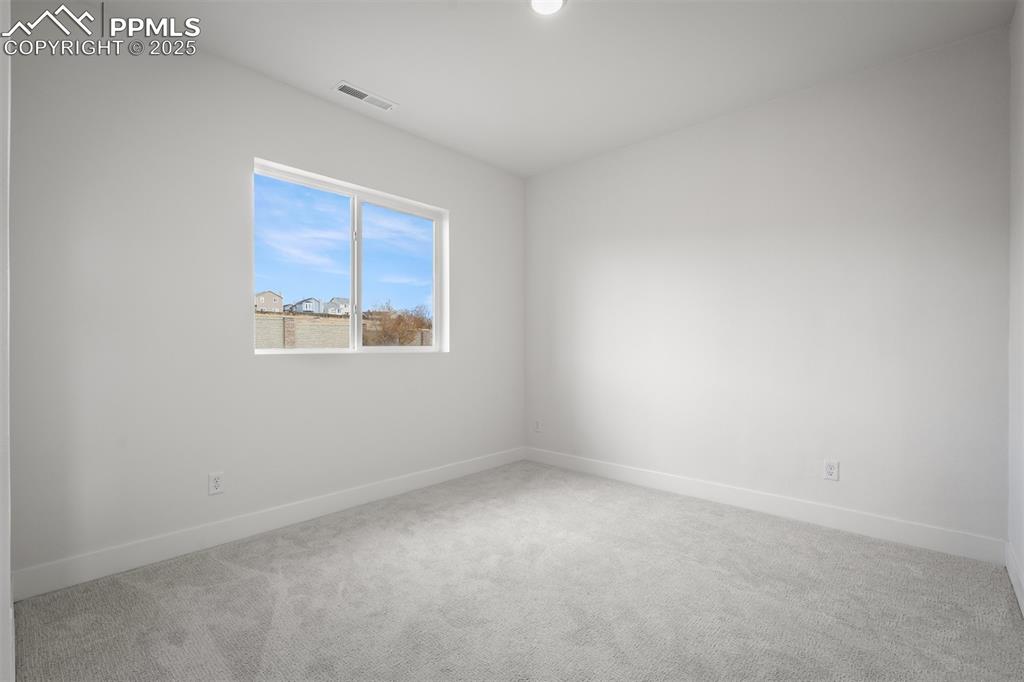 Image 25 of 33: Bedroom