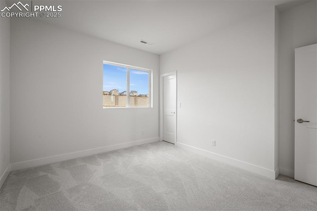 Image 28 of 33: Bedroom