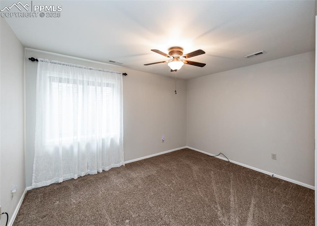 Image 35 of 43: Basement Bedroom