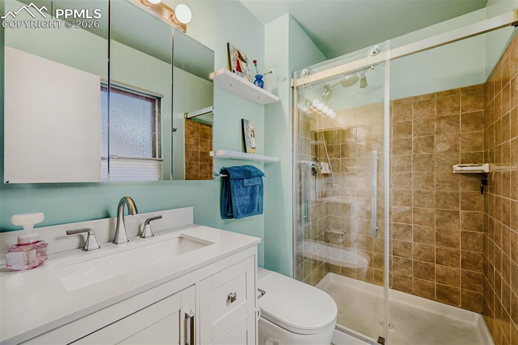 Image 16 of 21: Walk-in Shower & Bidet