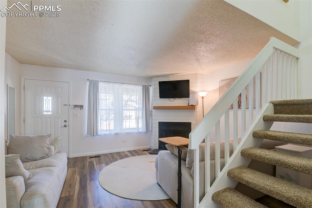 Image 12 of 25: Another view of the Living room. 