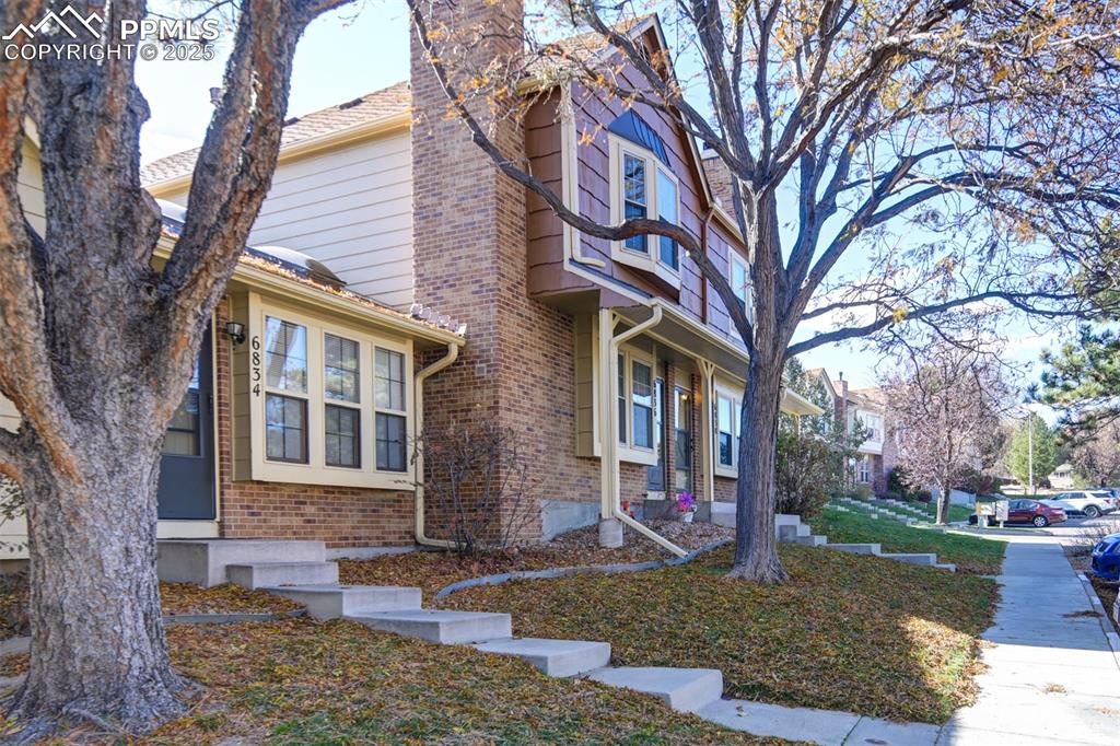 Image 2 of 25: View of property grounds from the front