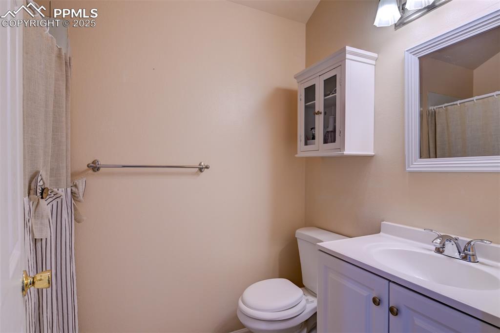 Image 20 of 25: 3/4 bath adjacent to the 2nd bedroom with a shower