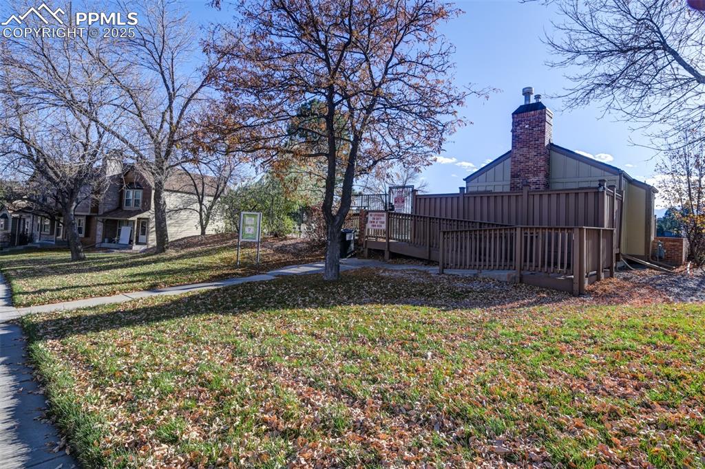 Image 24 of 25: Club house and outdoor pool 