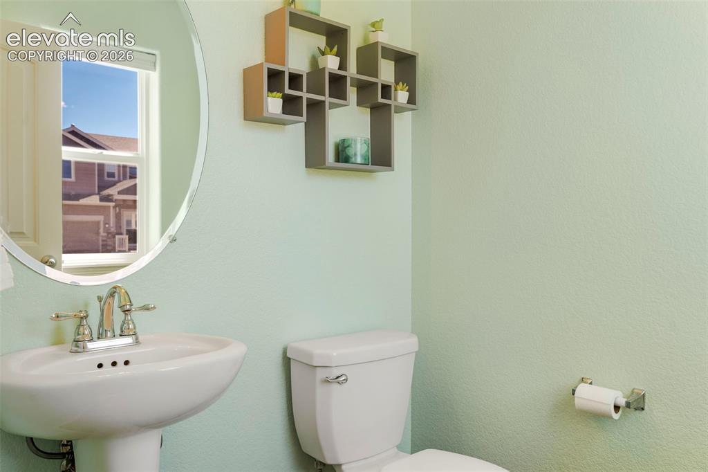 Image 4 of 32: 1/2 BATH ON MAIN