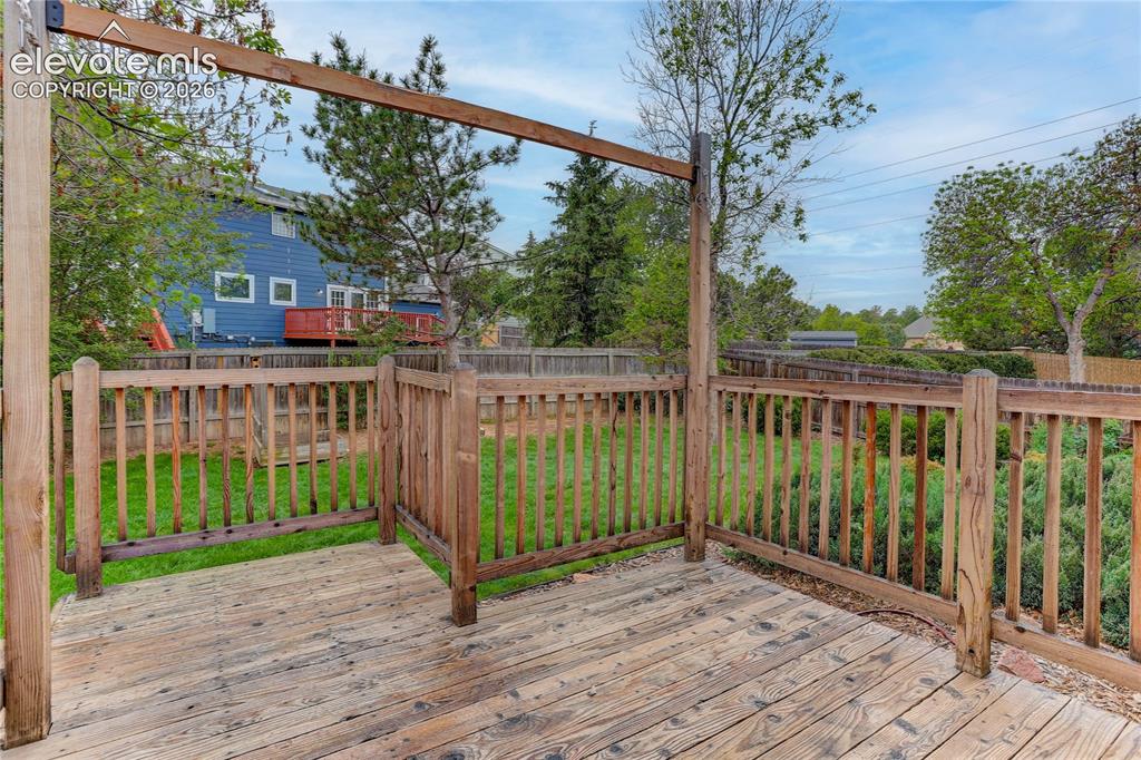 Image 18 of 21: Deck of kitchen for outdoor dining