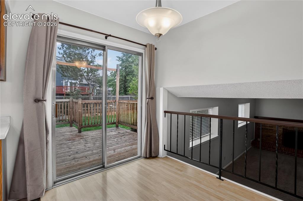 Image 7 of 21: Breakfast nook w/ walk-out