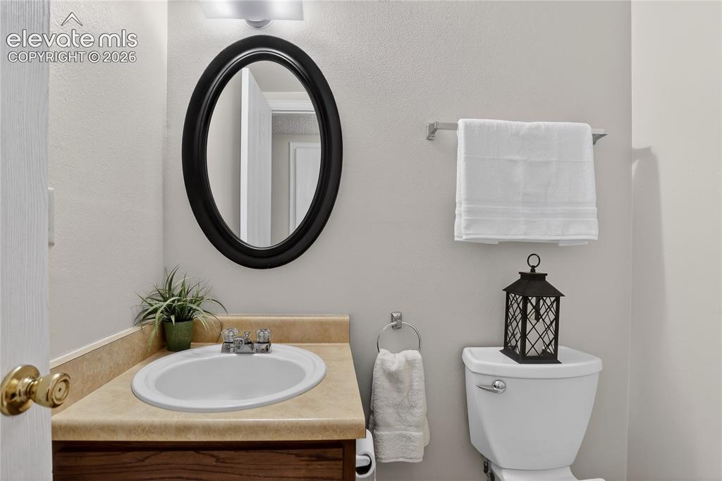 Image 9 of 21: Powder room - lower level