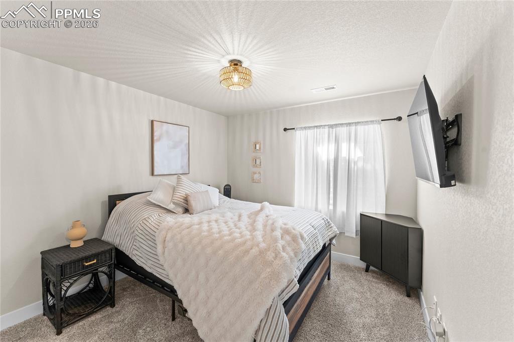 Image 36 of 49: Bedroom