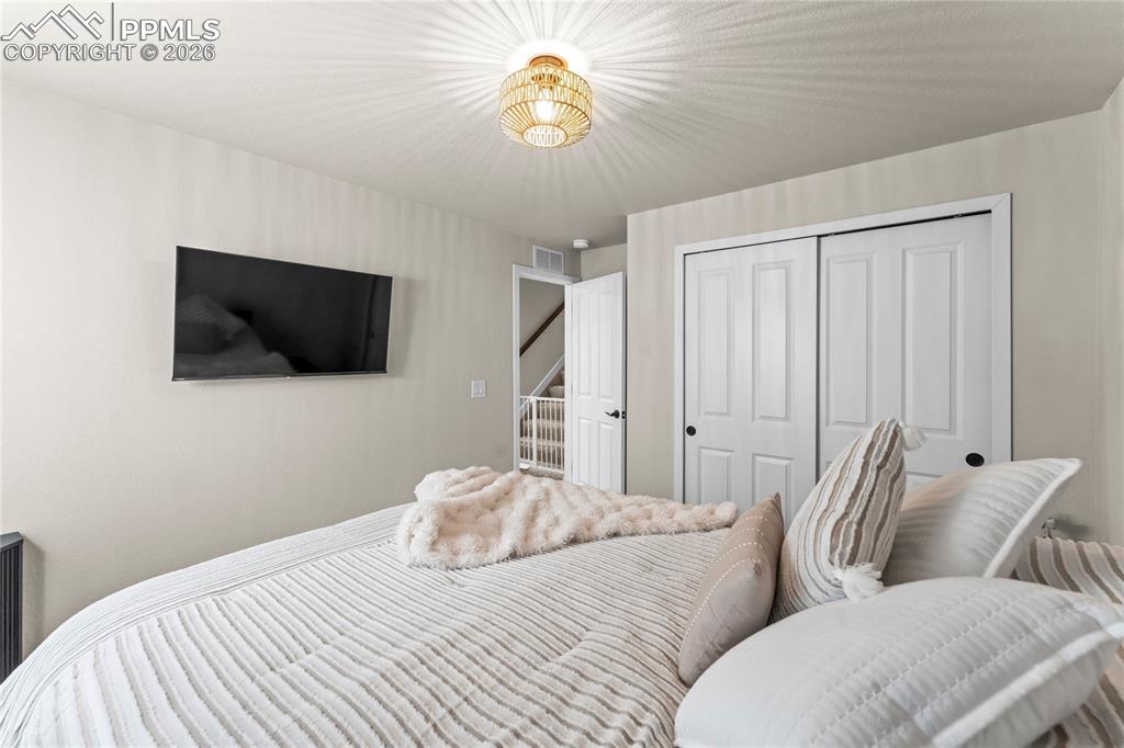 Image 38 of 49: Bedroom