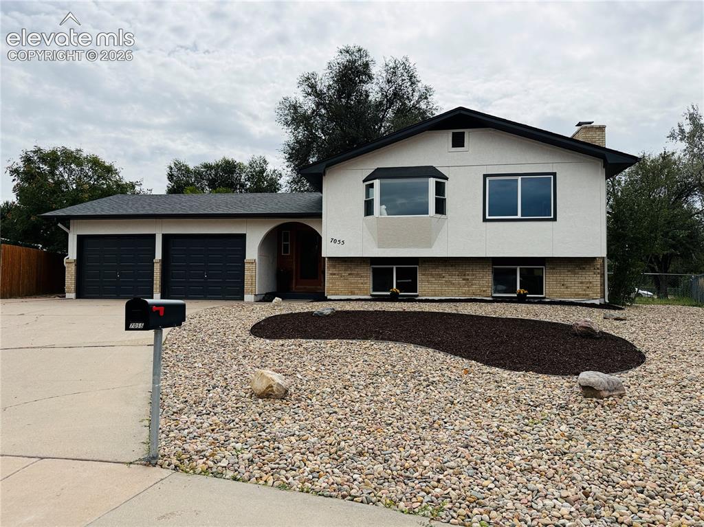 Image 1 of 25: Freshly painted, new roof and low maintenance landscaping