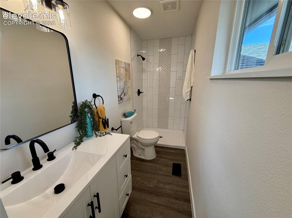 Image 17 of 25: Attached to primary bedroom. Newly renovated