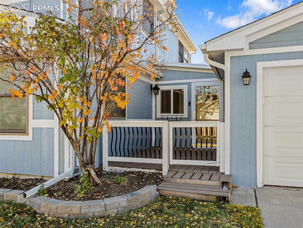 Image 2 of 29: Property entrance with a deck