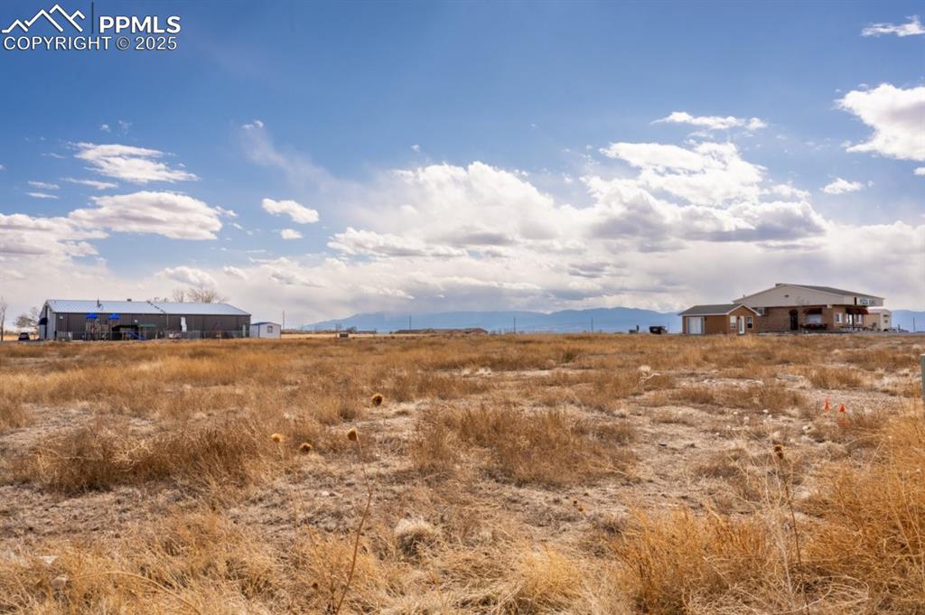 Image 15 of 18: View of yard with a rural view and a mountain view