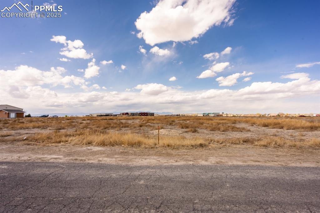Image 18 of 18: View of yard with a rural view