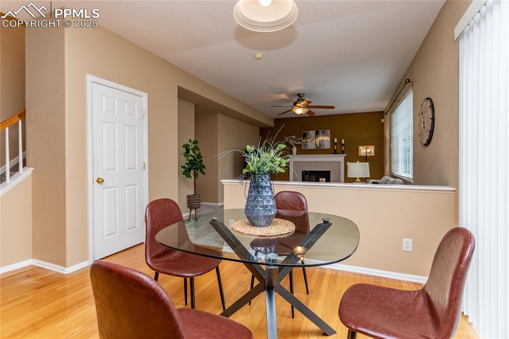 Image 11 of 40: Dining space with walk out.