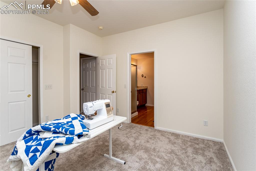 Image 15 of 40: Main level bedroom with bath attached. Great if anyone needs main level liv