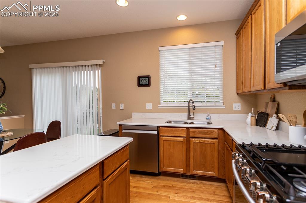 Image 8 of 40: Kitchen, stainless steel appliances. 