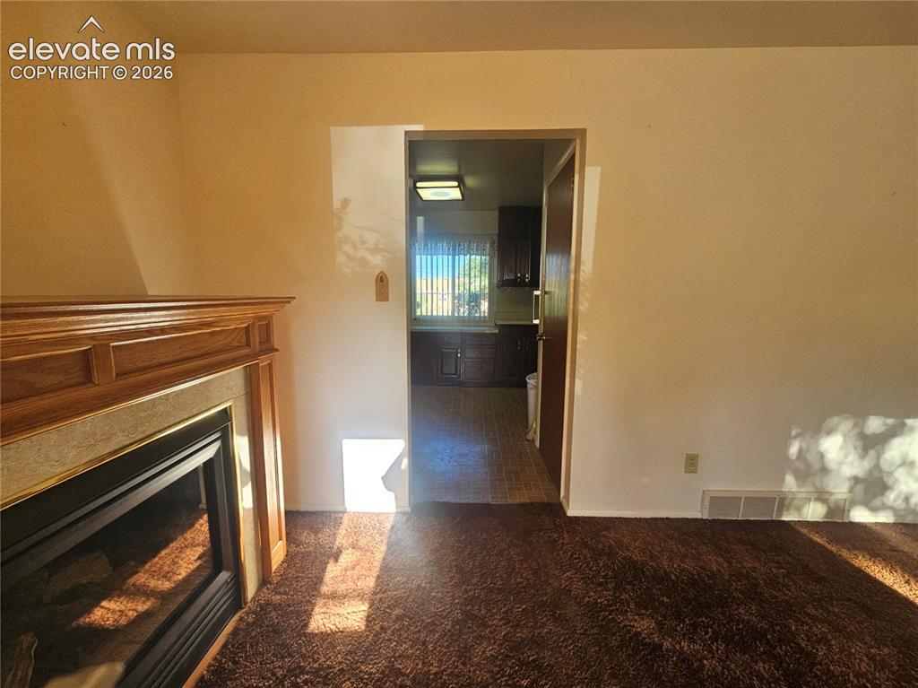 Image 11 of 37: Look toward the kitchen