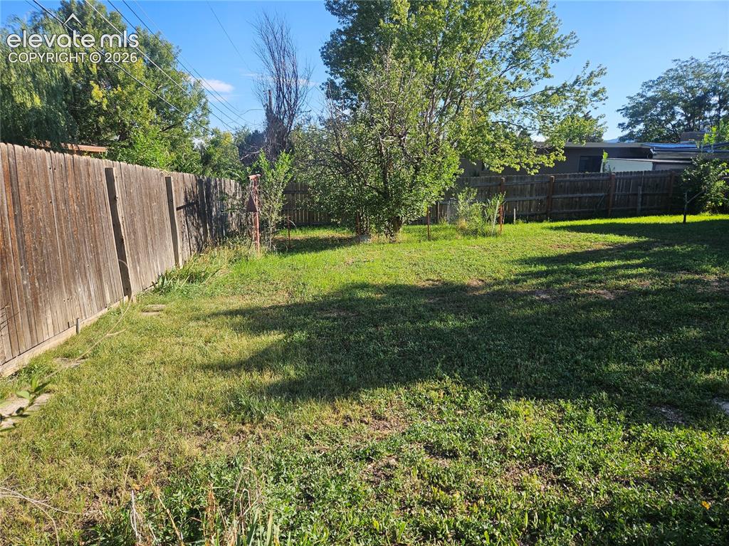 Image 35 of 37: Backyard privacy fencing
