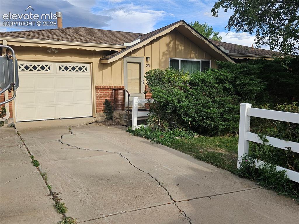 Image 5 of 37: Front exterior featuring a single-car garage.